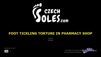 Foot tickling t. in pharmacy shop